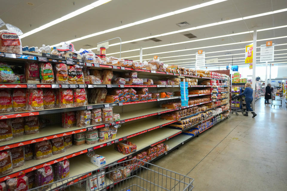 The bread aisle of HyVee in Southwest Des Moines on Fleur Drive is shown looking a little bare on Thursday, Dec. 22, 2022.