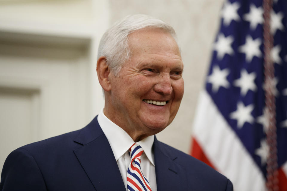 FILE - Former NBA basketball player and general manager Jerry West smiles before President Donald Trump presents him the Presidential Medal of Freedom, in the Oval Office of the White House, Thursday, Sept. 5, 2019, in Washington. Jerry West, who was selected to the Basketball Hall of Fame three times in a legendary career as a player and executive and whose silhouette is considered to be the basis of the NBA logo, died Wednesday morning, June 12, 2024, the Los Angeles Clippers announced. He was 86.(AP Photo/Alex Brandon, File)