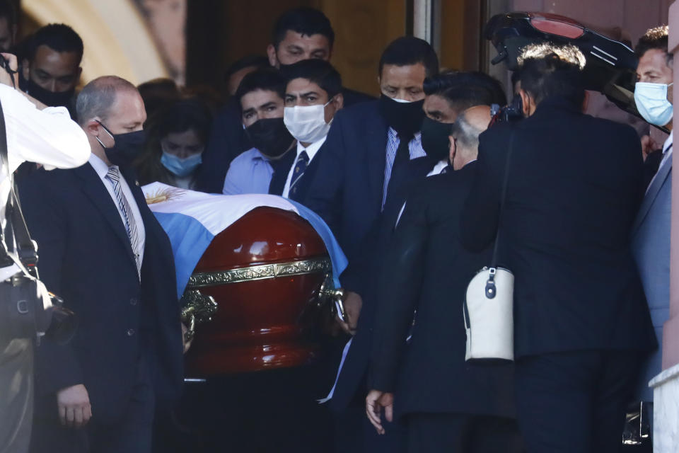 The flag-draped casket of Diego Maradona
