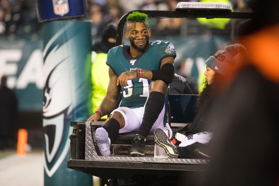 Eagles cornerback Jalen Mills is carted off the field after a devastating foot injury during a game against the Dallas Cowboys in December 2019 in Philadelphia.