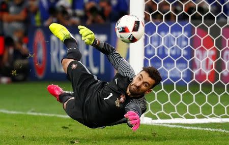 Football Soccer - Poland v Portugal - EURO 2016 - Quarter Final - Stade Velodrome, Marseille, France - 30/6/16. Portugal's Rui Patricio saves from Poland's Jakub Blaszczykowski during the penalty shootout. REUTERS/Michael Dalder/Livepic