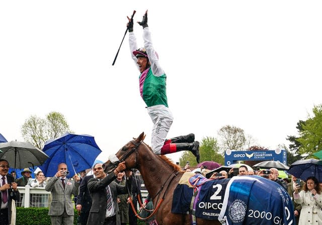 Jockey Frankie Dettori jumps off of Chaldean after winning the 2000 Guineas Stakes in May 