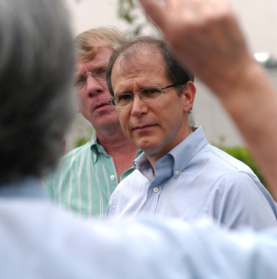 In this file photo, George Felos, then the attorney for Michael Schiavo, listens to a question from a reporter during a news conference about the Terri Schiavo case, March 26, 2005 in Dunedin, Florida.