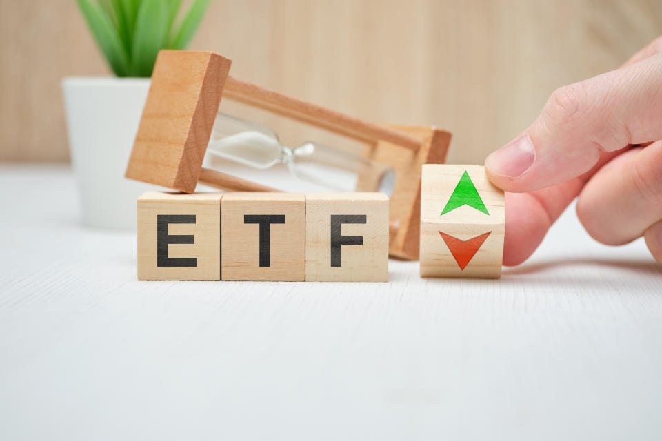 Concept business etf concept on wooden cubes. Close up.