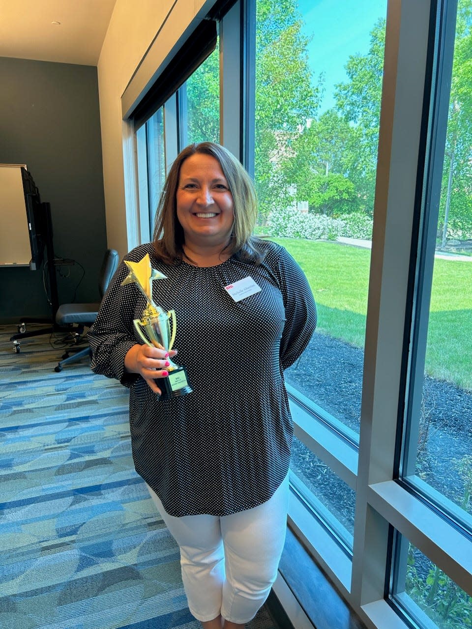 Michelle Albertini, CEO of MARCA Industries, won the trophy for the best 60-second speech at a recent BNI meeting. Each week, members share what referral they are seeking. BNI tracks the referrals given and how many turn into a sale.