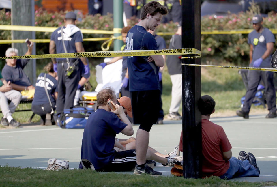 <p>People stand near the scene of a shooting at the Republican Congressional baseball team practice in Alexandria, Va, June 14, 2017. (Photo: Shawn Thew/EPA) </p>