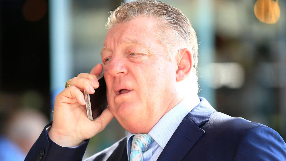 General manager of football Phil Gould is pictured here talking on the phone.