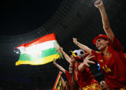 Spanish fans cheer ahead of the UEFA EURO 2012 quarter final match between Spain and France at Donbass Arena on June 23, 2012 in Donetsk, Ukraine. (Photo by Laurence Griffiths/Getty Images)