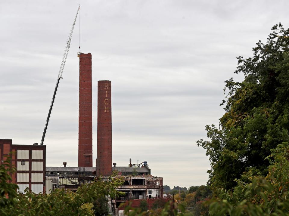 The downtown Akron skyline is losing two high-profile landmarks. The Eslich Wrecking Co. is tearing down the former B.F. Goodrich Co. smokestacks off South Main Street.