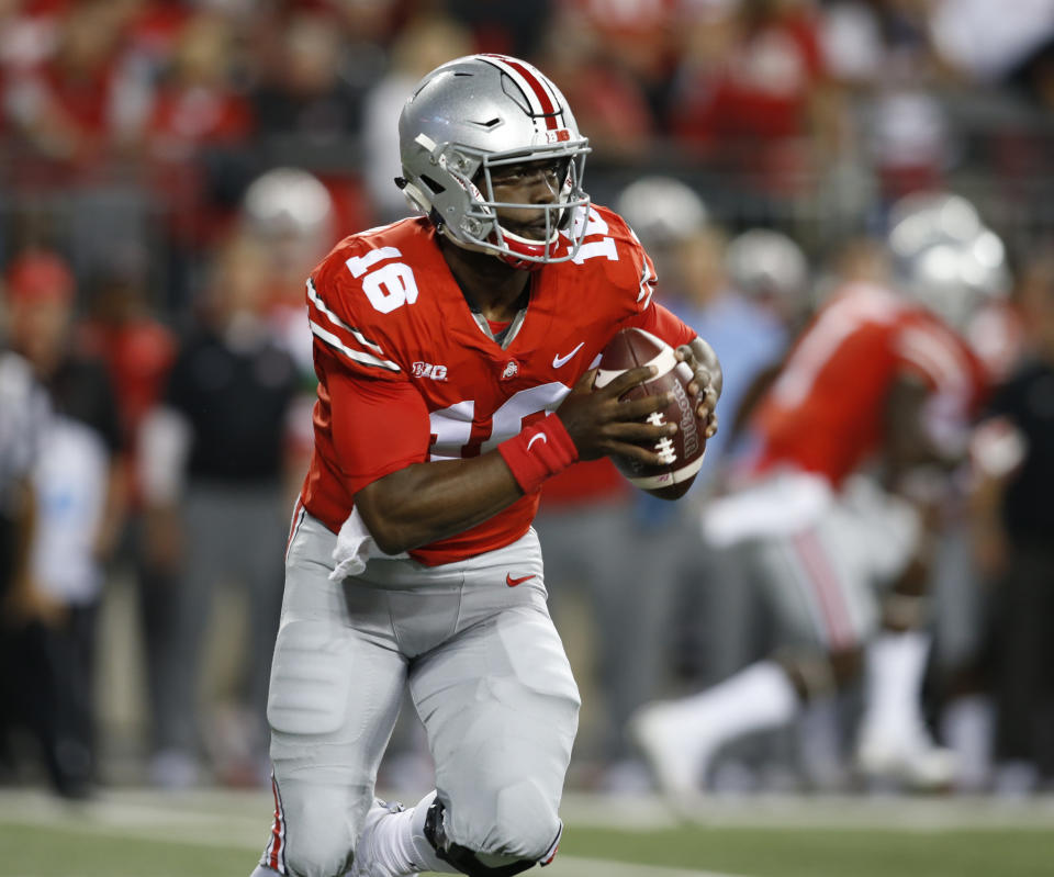 J.T. Barrett is taking some heat for the Buckeyes' offensive struggles against elite teams. (AP) 