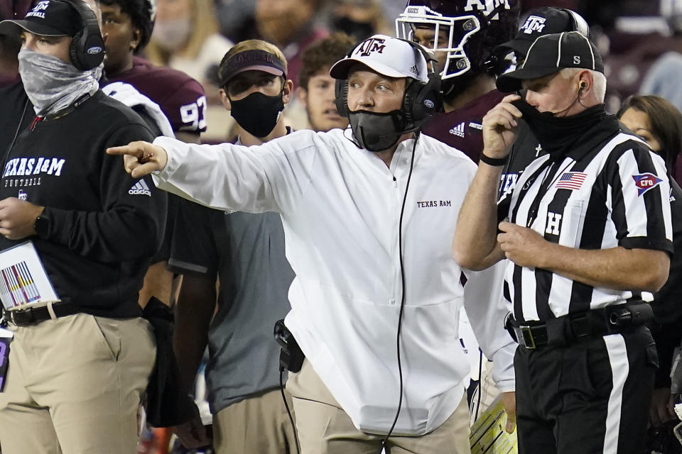 Texas A&M head coach Jimbo Fisher argues a call during the second half of an NCAA college football game against Arkansas Saturday, Oct. 31, 2020, in College Station, Texas. (AP Photo/Sam Craft)