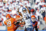 Nevada defensive tackle Tristan Nichols (95) tries to block a pass-attempt by Boise State quarterback Hank Bachmeier (19) in the second half of an NCAA college football game Saturday, Oct. 2, 2021, in Boise, Idaho. (AP Photo/Steve Conner)