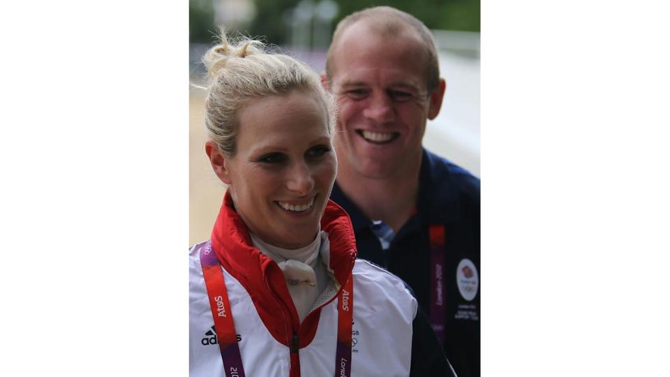 Great Britain's Zara Phillips with her husband Mike Tindall after they won silver in the Team Eventing Jumping Final on day four of the London Olympic Games at Greenwich Park, London.   (Photo by Andrew Milligan/PA Images via Getty Images)