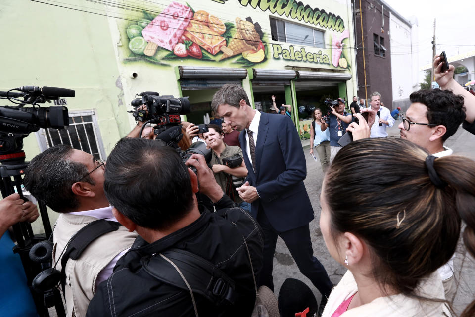 Democratic presidential candidate Beto O'Rourke talks with reporters after crossing into Ciudad Juarez, Mexico, Thursday, Aug. 8, 2019. O’Rourke has crossed the border into Mexico for the funeral of one of the 22 people killed in a mass shooting at a Walmart in El Paso, Texas. (AP Photo/Christian Chavez)