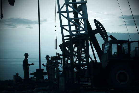 Silhouette of drilling rig.