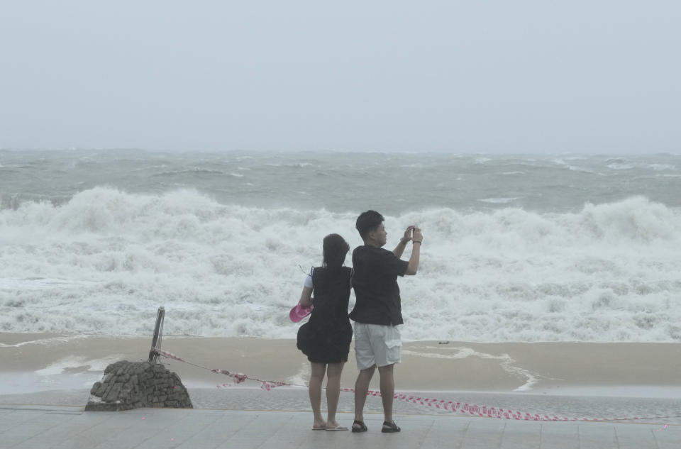 High waves crash a shore as the tropical storm named Khanun approaches to the Korean Peninsular, in Busan, Thursday, Aug. 10, 2023. (AP Photo/Ahn Young-joon)