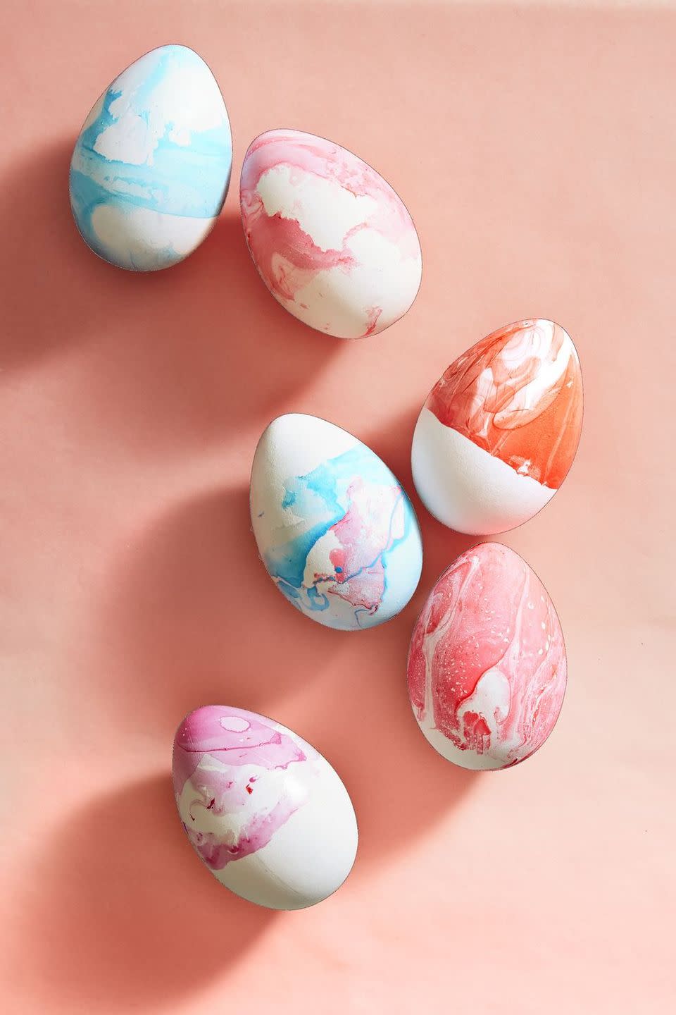 <p>Put that old nail polish to good use, and watch your eggs become stained with the prettiest hues. Don't eat these ones, though!</p><p><strong><em>Get the tutorial at <a href="https://www.goodhousekeeping.com/holidays/easter-ideas/g711/easter-spring-crafts/?slide=21" rel="nofollow noopener" target="_blank" data-ylk="slk:Good Housekeeping.;elm:context_link;itc:0;sec:content-canvas" class="link ">Good Housekeeping.</a> </em></strong></p><p><strong><a class="link " href="https://www.amazon.com/essie-Polish-Glossy-Finish-Slippers/dp/B0030IMVZ6/ref=sr_1_1_sspa?crid=20WQDCRQ196V6&dchild=1&keywords=nail+polish&qid=1611939953&sprefix=NAIL+PO%2Caps%2C173&sr=8-1-spons&psc=1&spLa=ZW5jcnlwdGVkUXVhbGlmaWVyPUFIWVQ2SURHSFdCV04mZW5jcnlwdGVkSWQ9QTEwMzIxNTZVWVZFN0lXSElLSlgmZW5jcnlwdGVkQWRJZD1BMDc4NTg1NDJNRjZIOEE2OEo0WTgmd2lkZ2V0TmFtZT1zcF9hdGYmYWN0aW9uPWNsaWNrUmVkaXJlY3QmZG9Ob3RMb2dDbGljaz10cnVl&tag=syn-yahoo-20&ascsubtag=%5Bartid%7C10070.g.1751%5Bsrc%7Cyahoo-us" rel="nofollow noopener" target="_blank" data-ylk="slk:SHOP NAIL POLISH;elm:context_link;itc:0;sec:content-canvas">SHOP NAIL POLISH</a><br></strong></p>