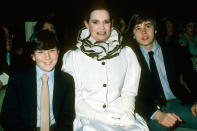 <p>Anderson smiled while out with his mother and brother in 1980. </p>