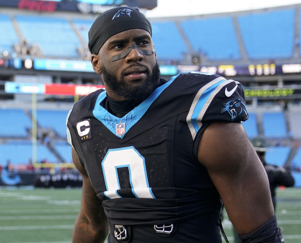 FILE - Carolina Panthers linebacker Brian Burns walks on the field following an NFL football game against the Tampa Bay Buccaneers, Jan. 7, 2024, in Charlotte, N.C. The New York Giants have agreed to acquire edge rusher Burns from the Panthers, a person familiar with the deal told The Associated Press, Monday, March 11, 2024. Burns is getting a five-year contract worth up to $150 million with $87.5 million in guarantees, according to the person who spoke to the AP on condition of anonymity because the deal cannot be completed until Wednesday. (AP Photo/Erik Verduzco, File)