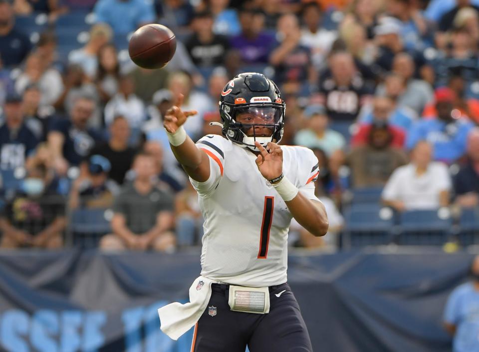Chicago Bears quarterback Justin Fields (1) throws a pass.