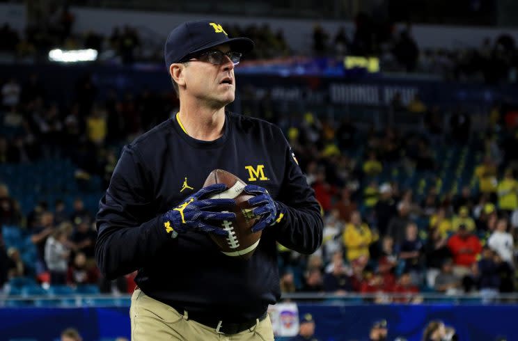 Michigan coach Jim Harbaugh goes about recruiting in unconventional ways. (Getty)