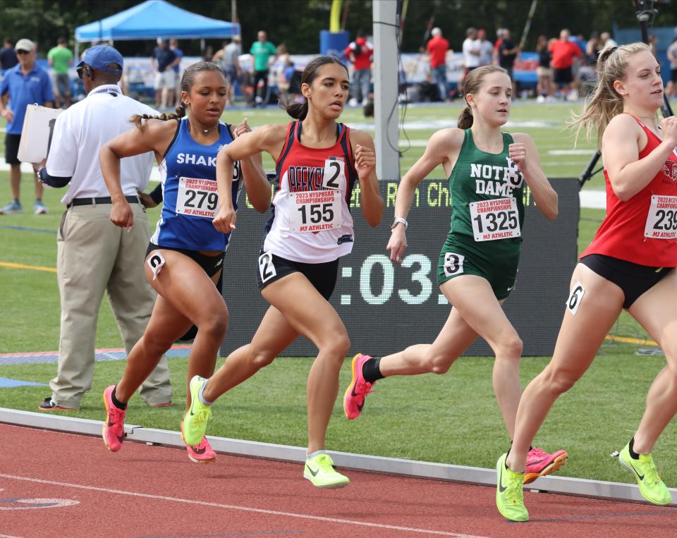 Juliette Salazar from Peekskill competes in the girls 800 meter run during the New York State Track and Field Championships at Middletown High School, June 9, 2023.