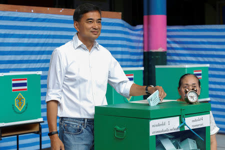 Democrat Party leader and former Thailand's prime minister Abhisit Vejjajiva casts his ballot to vote in the general election at a polling station in Bangkok, Thailand, March 24, 2019. REUTERS/Krit Promsakla Na Sakolnakorn