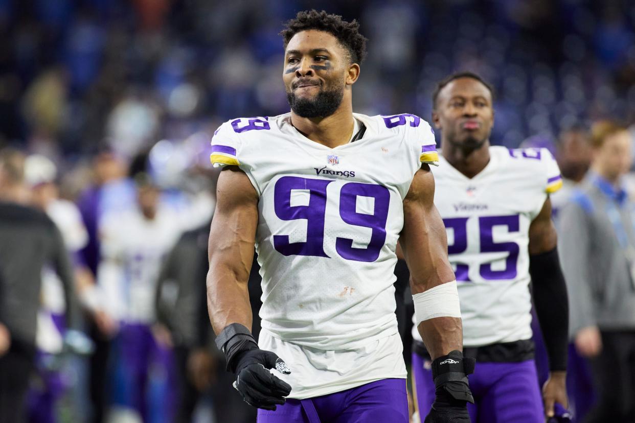 Danielle Hunter walks off the field during the Vikings' game against the Lions on Dec. 11, 2022.