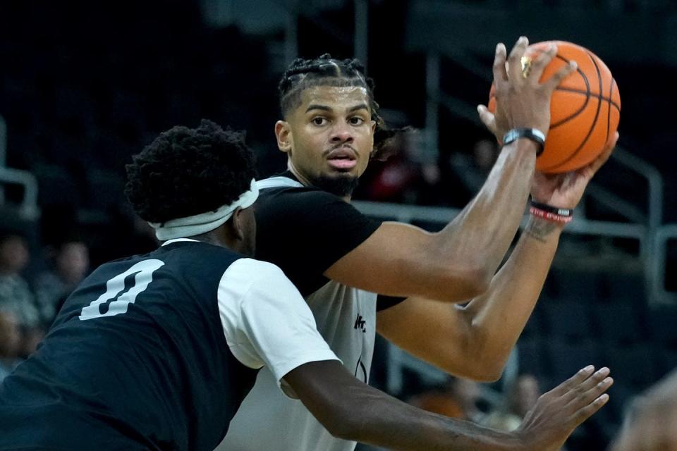 Bryce Hopkins, looking to made a pass at the annual Mal Brown scrimmage earlier this month, was a first-team All-Big East selection, it was announced on Tuesday at the conference's Media Day.