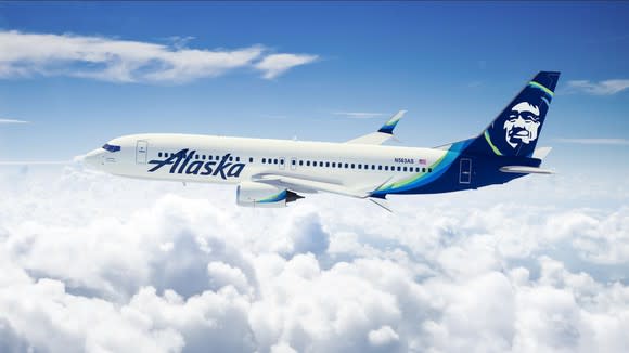 A rendering of an Alaska Airlines jet flying over clouds