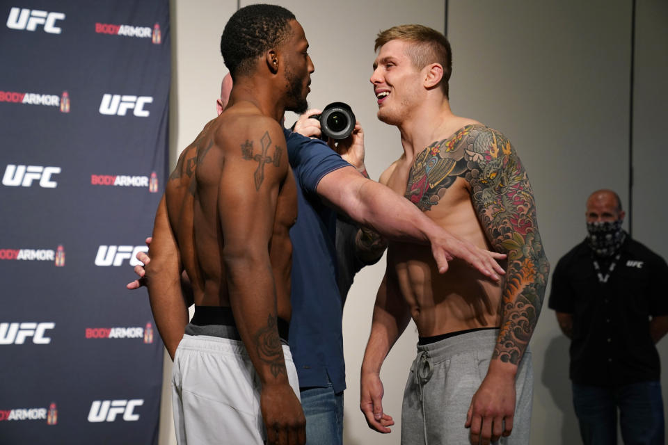 JACKSONVILLE, FLORIDA - MAY 12: (L-R) Opponents Karl Roberson and Marvin Vettori of Italy face off during the official UFC Fight Night weigh-in on May 12, 2020 in Jacksonville, Florida. (Photo by Cooper Neill/Zuffa LLC via Getty Images)