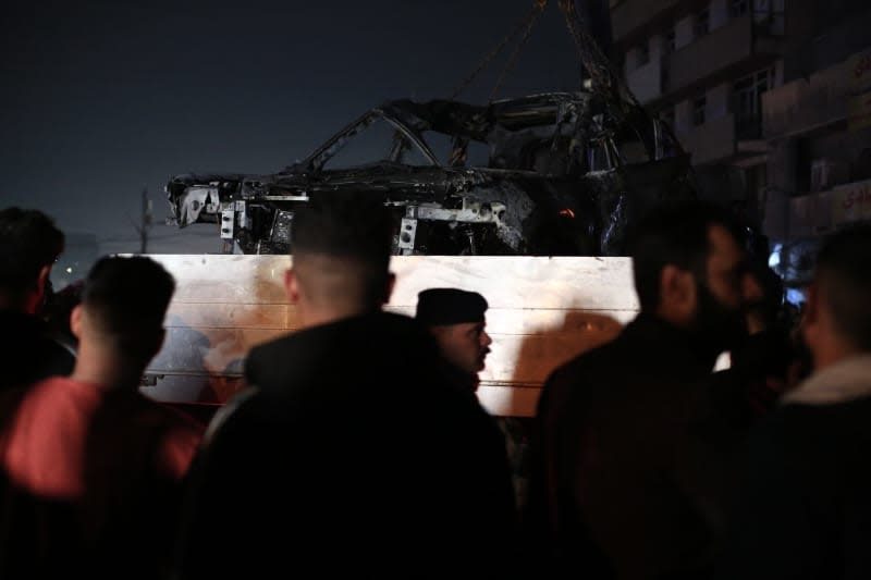 A vehicle that was hit by a drone strike, reportedly killing three people including two leaders of a pro-Iran group, is carried away in Baghdad. A media outlet close to the Iran-backed militia, reported that Abu Baqir al-Saadi, a leader in the Hashd Shaabi group, was killed along with his aide. Ameer Al-Mohammedawi/dpa