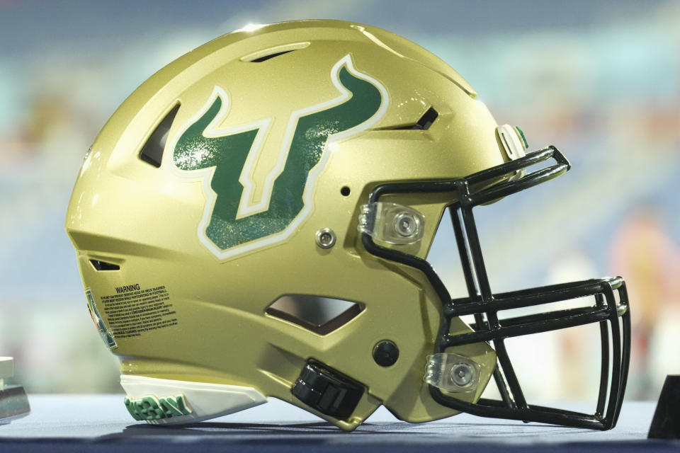 BOCA RATON, FL - DECEMBER 21: South Florida Bulls helmet rests near the sidelines during the RoomClaim.com Boca Raton Bowl game between the Syracuse Orange and the South Florida (USF) Bulls (Photo by Peter Joneleit/Icon Sportswire via Getty Images)