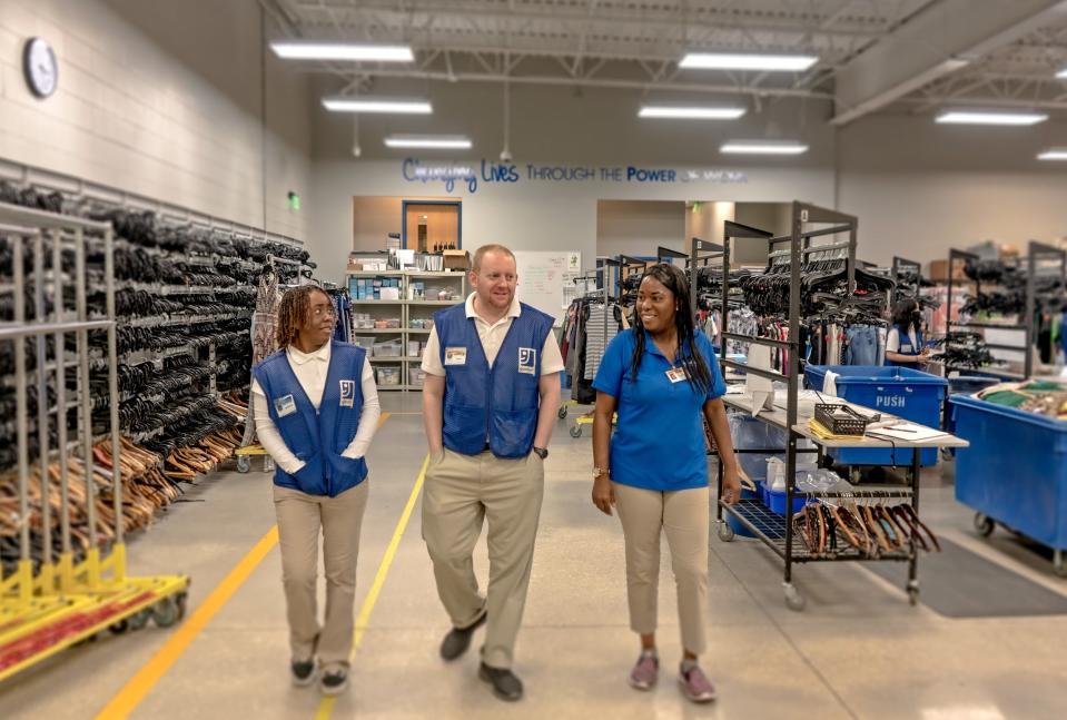 Goodwill Manasota team members Joshanna Franklin, left, Noah Galer and Lekesha Dunbar at Goodwill’s Corporate Campus.