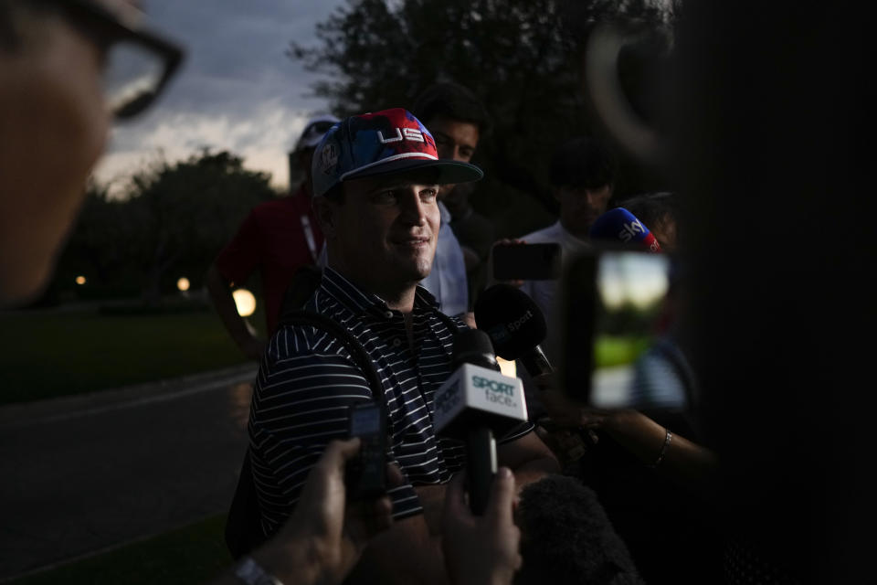 USA Ryder Cup team captain Zach Johnson talks to reporters as he returns with members of his team at a hotel in Rome, Friday, Sept. 8, 2023, at the end of a practice session at the Marco Simone golf club where the 2023 Ryder Cup will played starting next Sept. 29. (AP Photo/Andrew Medichini)