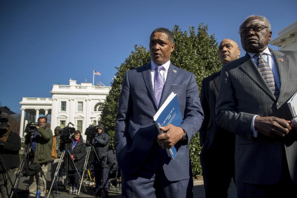 Rep. Cedric Richmond, D-La., the chairman of the Congressional Black Caucus, center, accompanied Rep. Andre Carson, D-Ind., second from right, and Rep. Jim Clyburn, D-S.C., right, speak to members of the media after they and other members of the Congressional Black Caucus meet with President Donald Trump in the Cabinet Room of the White House, Wednesday, March 22, 2017, in Washington. (AP Photo/Andrew Harnik)