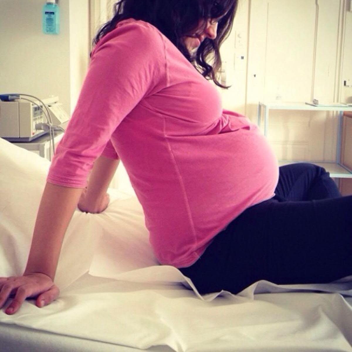 Pregnant Woman Wearing Pink Shirt in Labor Foap