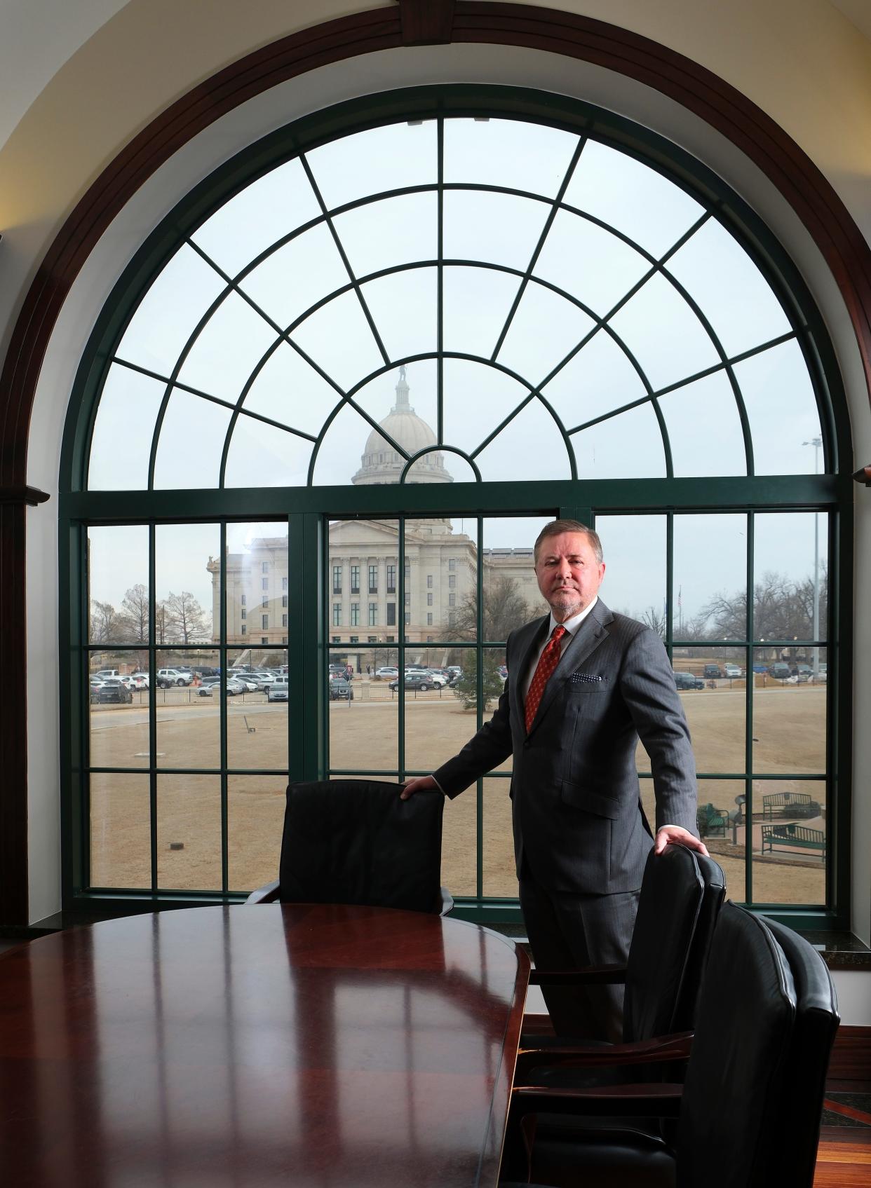 Oklahoma Attorney General Gentner Drummond is pictured Feb. 21 in his office. Since entering office last month, Drummond, a Republican, has taken on multiple investigations with connections to the governor or his Cabinet members. He said those cases required the prosecutorial muscle only the attorney general’s office could provide.