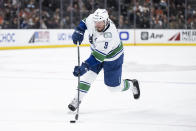 Vancouver Canucks center J.T. Miller shoots during the second period of the team's NHL hockey game against the Anaheim Ducks in Anaheim, Calif., Sunday, March 19, 2023. (AP Photo/Kyusung Gong)