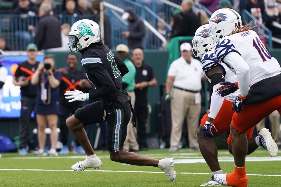 Tulane wide receiver Chris Brazzell II (17) carries on a touchdown reception in the first half of an NCAA college football game against UTSA in New Orleans, Friday, Nov. 24, 2023. (AP Photo/Gerald Herbert)
