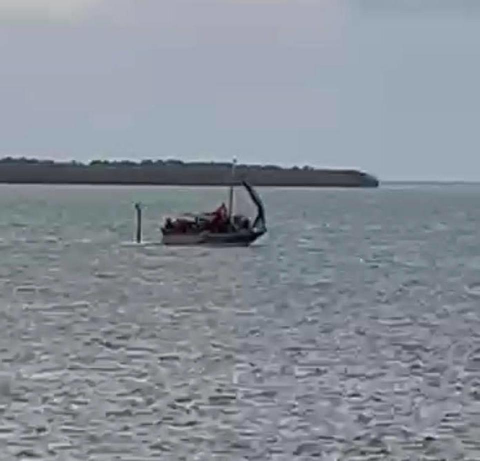 A migrant sailboat approaches the Upper Florida Keys community of Tavernier Thursday morning, Feb. 9, 2023.