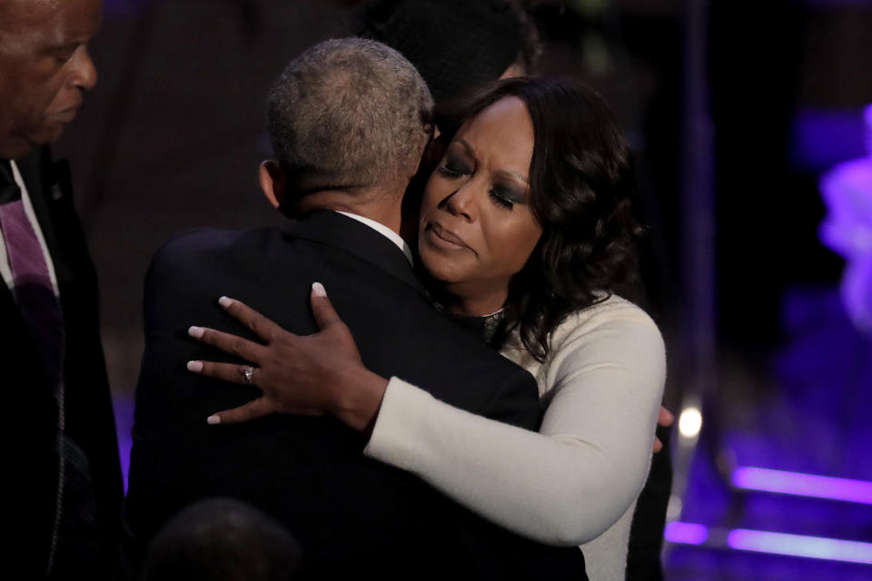 Maya Rockeymoore Cummings, right, is greeted by former President Barack Obama during funeral services for her husband, the late Rep. Elijah Cummings, Friday, Oct. 25, 2019, in Baltimore. The Maryland congressman and civil rights champion died Thursday, Oct. 17, at age 68 of complications from long-standing health issues. (AP Photo/Julio Cortez)
