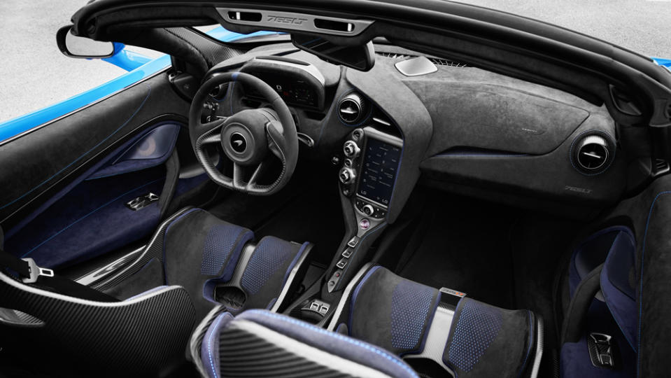 A steering wheel free of switches contributes to a cockpit that feels pared-back and functional. - Credit: Photo: Courtesy of McLaren Automotive Limited.