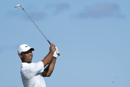 December 1, 2017; New Providence, The Bahamas; Tiger Woods hits his fairway shot on the fourth hole during the second round of the Hero World Challenge golf tournament at Albany. Kyle Terada-USA TODAY Sports