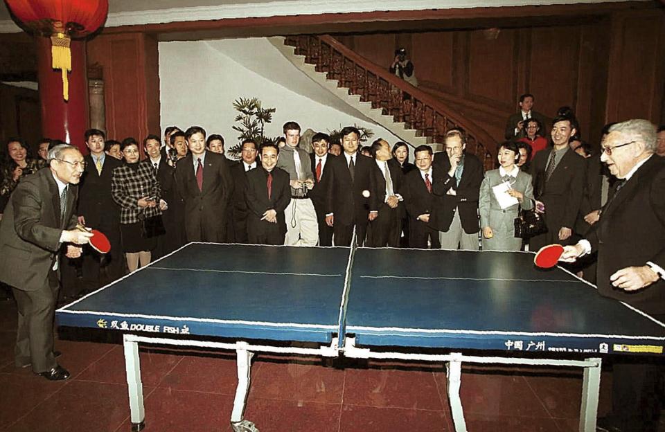 FILE - Then Chinese Vice Premier Li Lanqing, left, plays table tennis with former U.S. Secretary of State Henry Kissinger, right, at the Diaoyutai State Guesthouse in Beijing on Sunday, March 18, 2001. Official China called Kissinger “an old friend.” A commentator likened him to a giant panda, a goodwill ambassador between two countries that have been more often at odds over the decades than not. Kissinger, who died Wednesday, Nov. 29, 2023, developed a special relationship with China in the second half of his 100-year-long life.(Yao Dawei, Xinhua via AP photo)