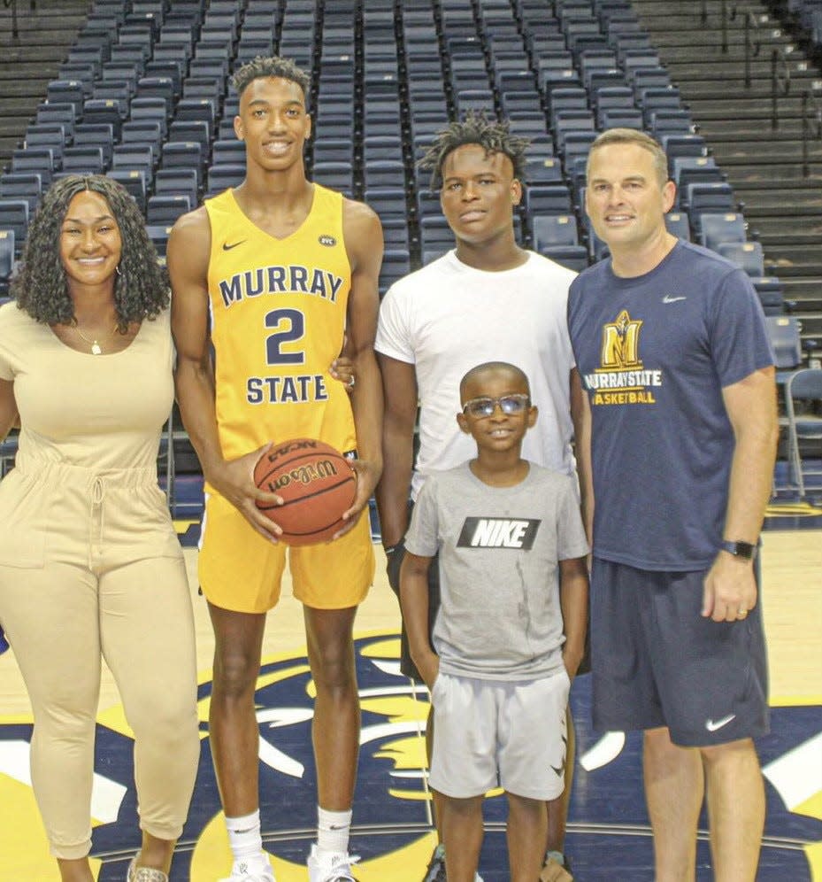 LSU basketball center Corneilous Williams on a recruiting visit with his brothers, Ja'Quarius and Malachi, mother Deirdre Brown. They're pictured with LSU coach and former Murray State coach Matt McMahon.