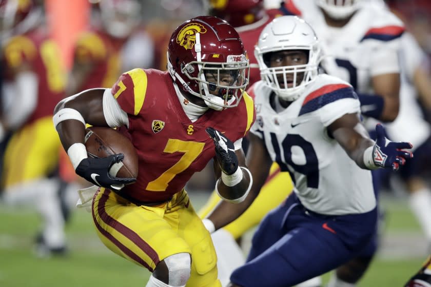 Southern California running back Stephen Carr (7) runs against Arizona during the first half.