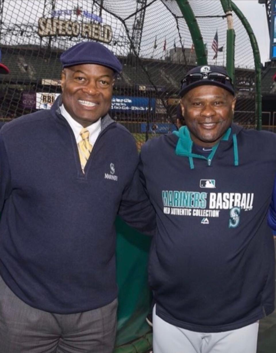 Mariners play-by-play announcer Dave Sims with Seattle manager Lloyd McClendon, who led the team in 2014 and 2015.