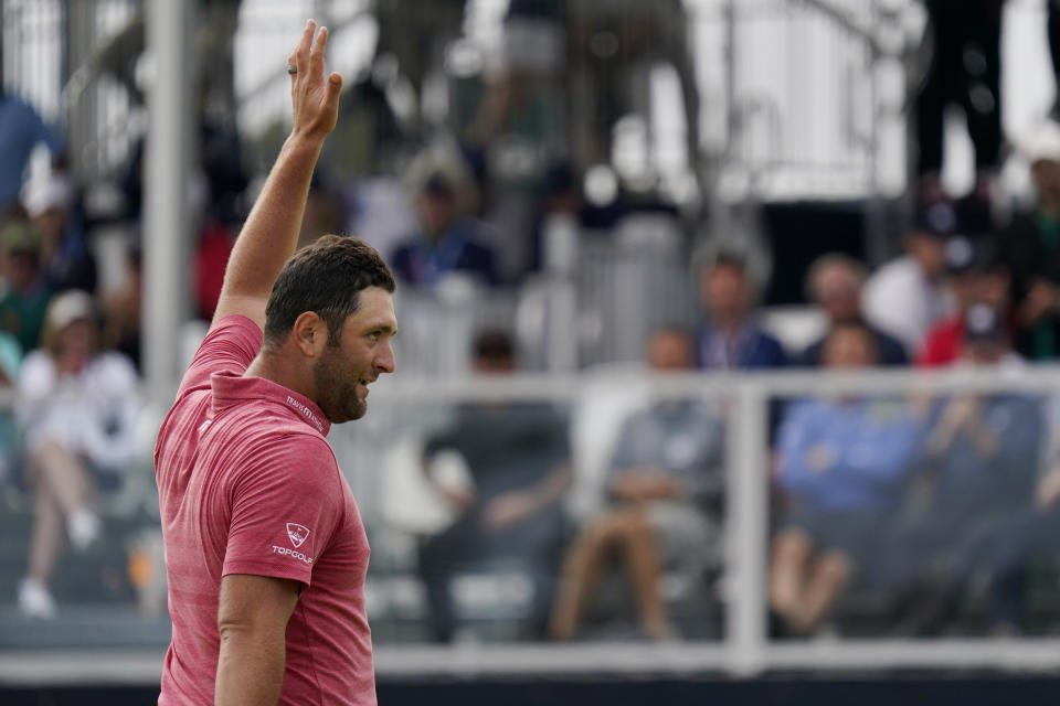 Jon Rahm, of Spain, reacts after making his birdie putt on the 18th green during the final round of the U.S. Open Golf Championship, Sunday, June 20, 2021, at Torrey Pines Golf Course in San Diego. (AP Photo/Gregory Bull)