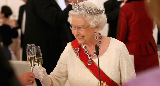From her favourite tipple to most-loved cake, here are 10 of the Queen's favourite things. (Getty Images)